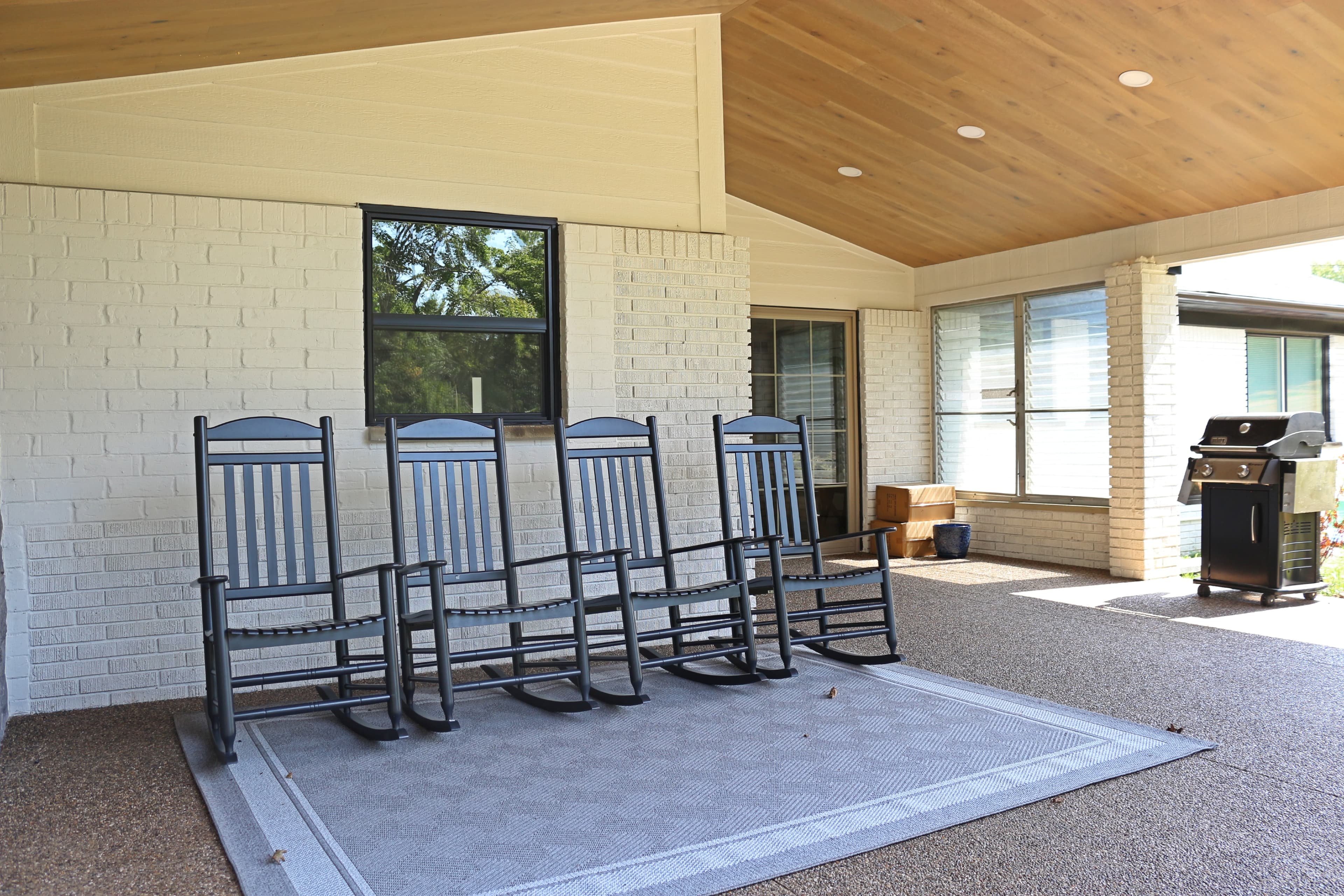 Spacious back porch area for outdoor relaxation