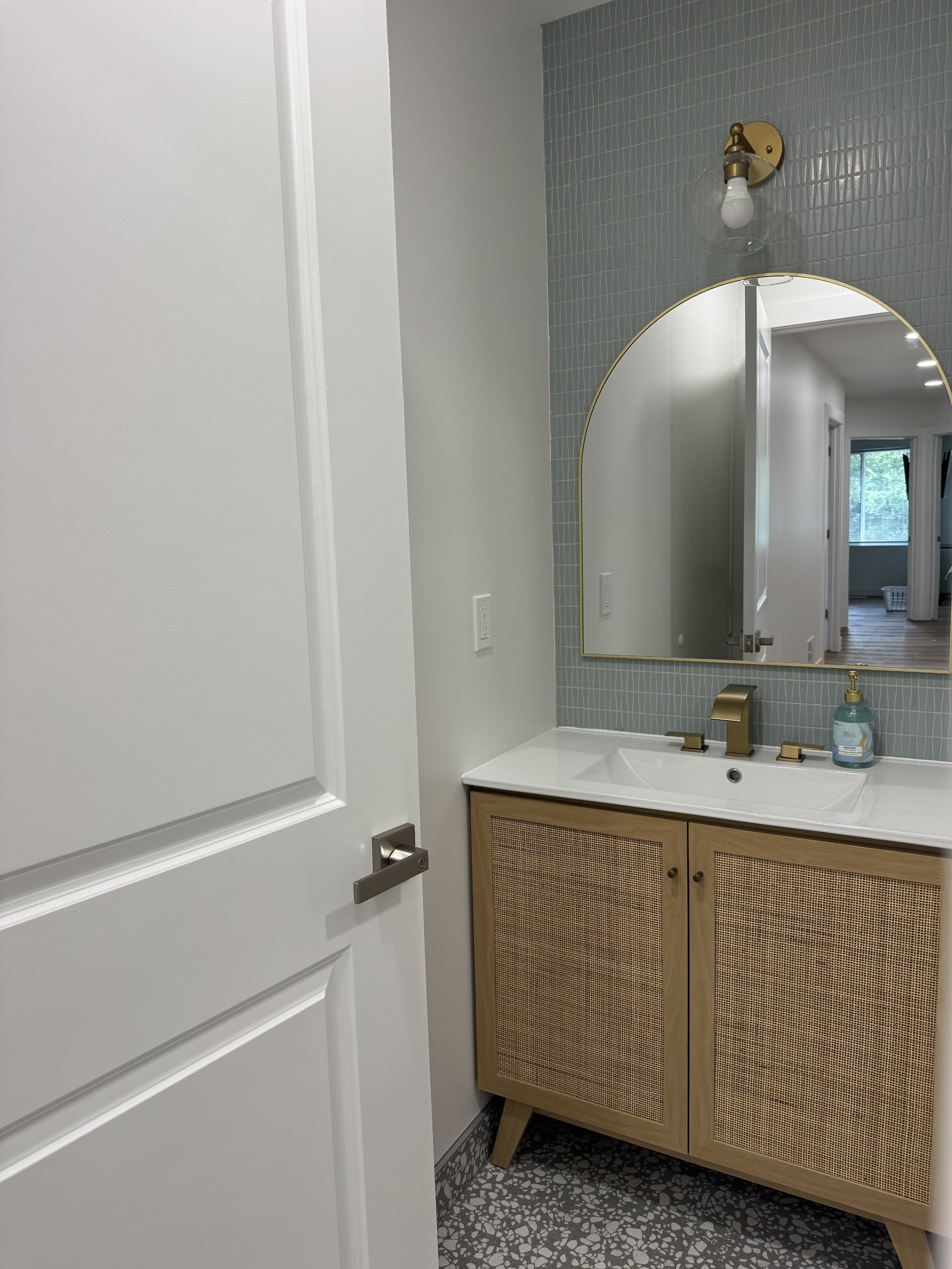 Service bathroom with sink and toilet